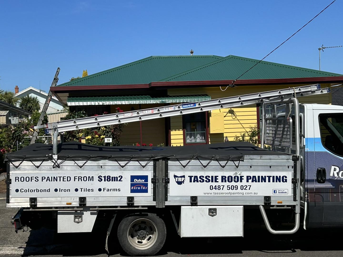Tassie Roof Painting work truck on the job